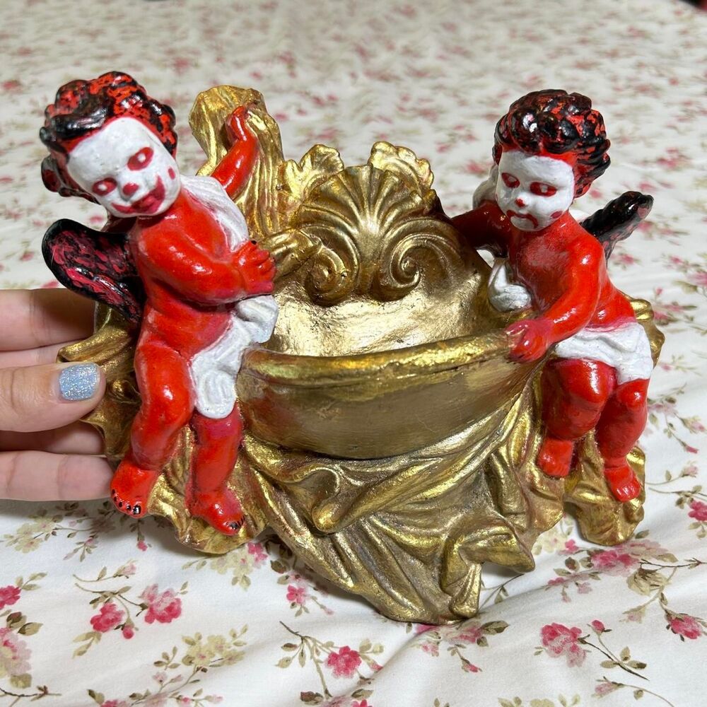 Devilish gothic clown cherubs ornate gold holy water font pocket